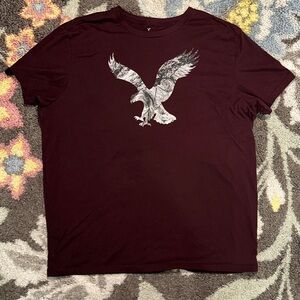 American Eagle Outfitters Burgundy Tee with Eagle Design